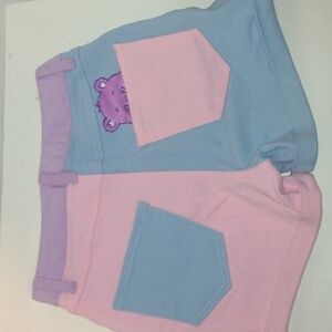 DOLLS kill care bears peekaboo block colored shorts size extra small